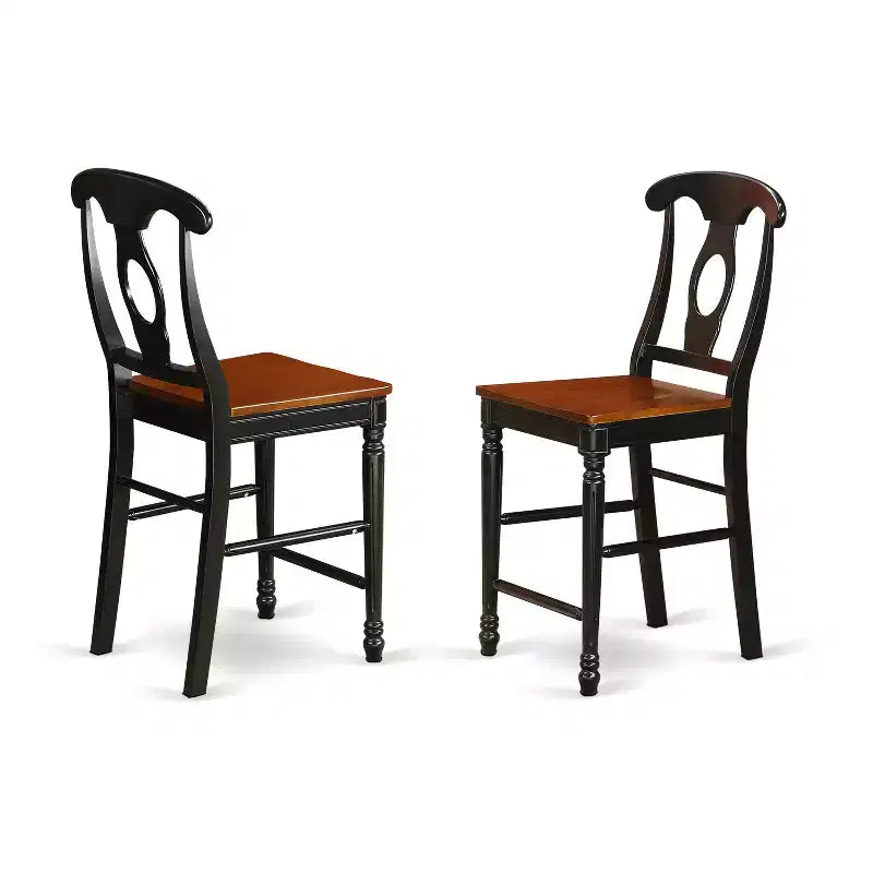 Tavolo da pranzo rotondo HomeStock da 3 pezzi con finitura nera, piano in legno massello e 2 sedie